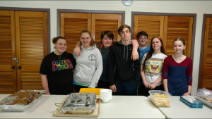 youth serving in soup kitchen 2